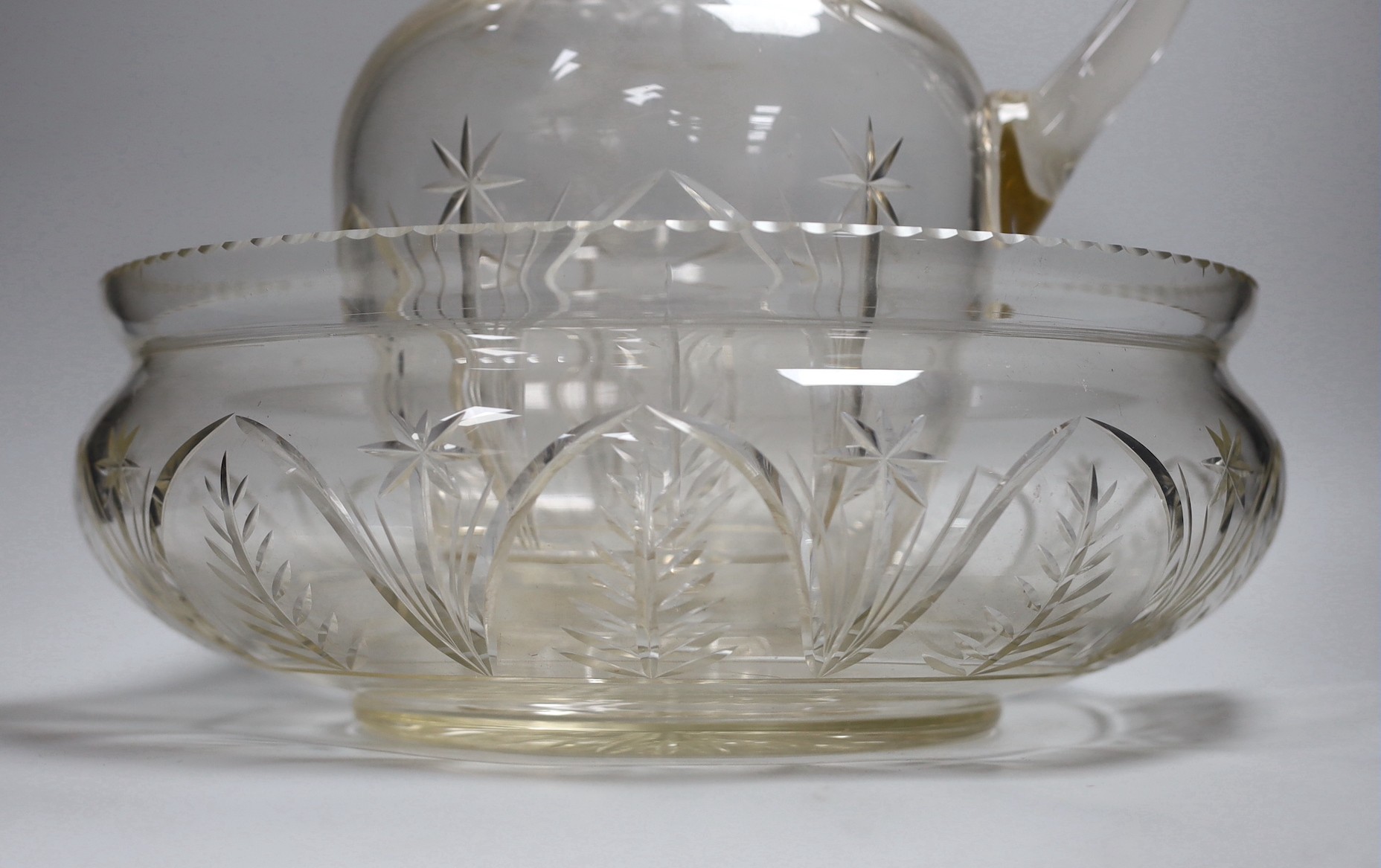 A Victorian/Edwardian cut glass toilet jug and basin